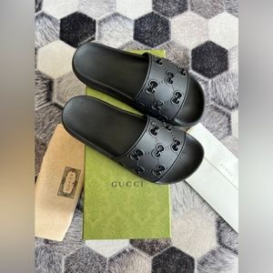 Women’s Black Gucci slides